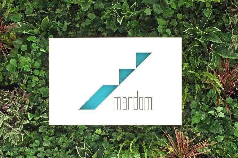 The logo on the planted wall
